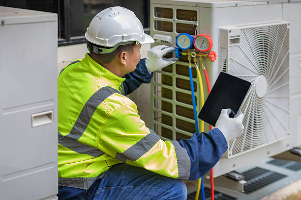 Professional Heat Pump Repair technician working in Nokomis, IL